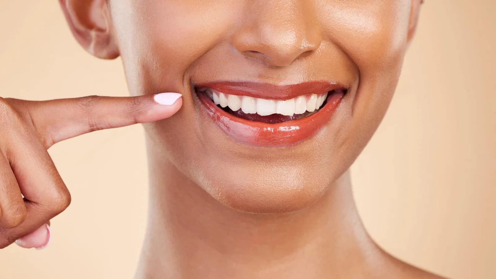 Patient with brighter smile after teeth whitening at Groot Dental in Oshawa