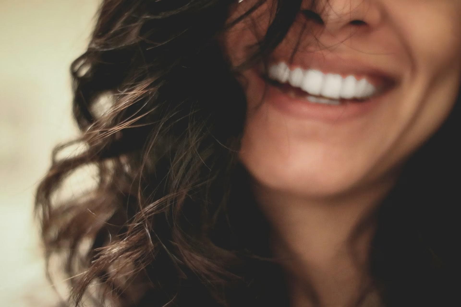 Person smiling with brighter and confident smile